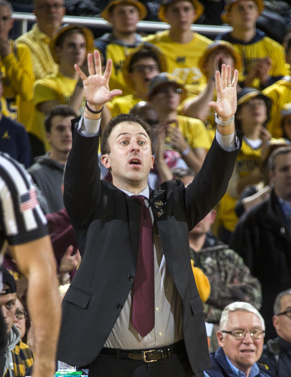 Minnesota head coach Richard Pitino signals his players from court side in the second half of an NCAA college basketball game against Michigan at Crisler Center in Ann Arbor, Mich., Tuesday, Jan. 22, 2019. Michigan won 59-57. (AP Photo/Tony Ding)