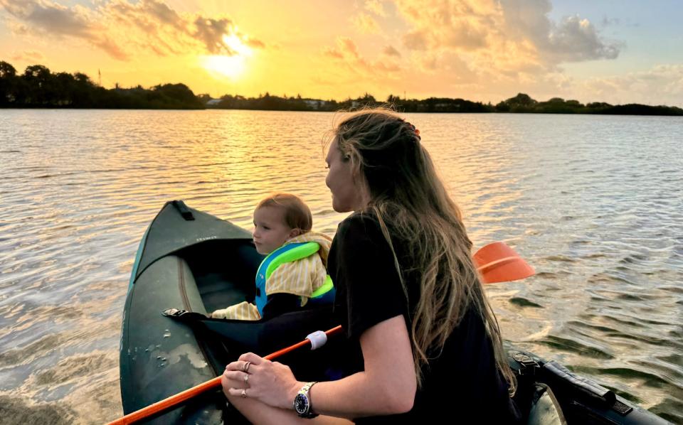 Annabel Fenwick Elliott canoeing with her son Jasper in Mauritius