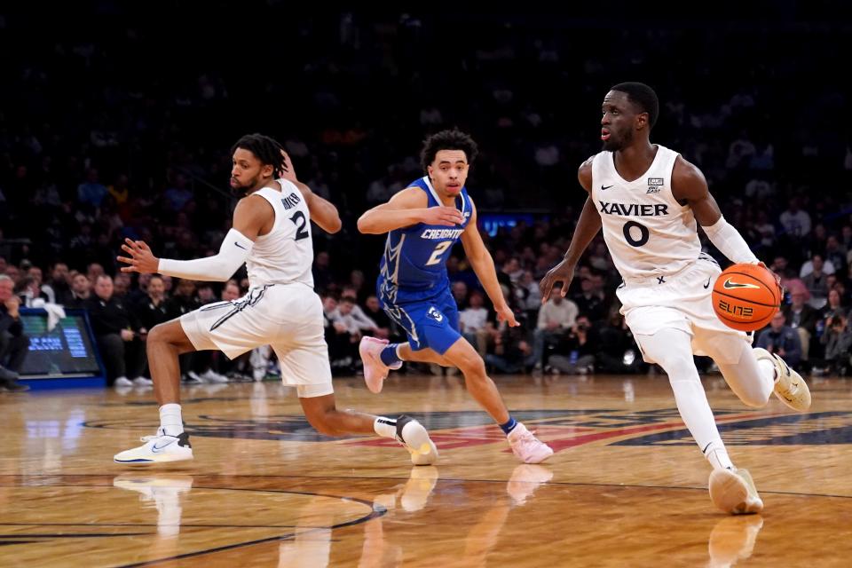 Xavier Musketeers guard Souley Boum (0) drives to the basket in the first half of an NCAA college basketball game against the Creighton Bluejays during the semifinal round of the Big East Conference tournament, Friday, March 10, 2023, at Madison Square Garden in New York. 