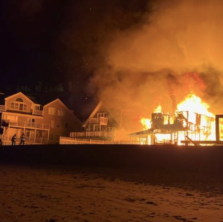 Several homes burned in an overnight fire in the Minot Beach neighborhood of Scituate Friday, March 24, 2023.