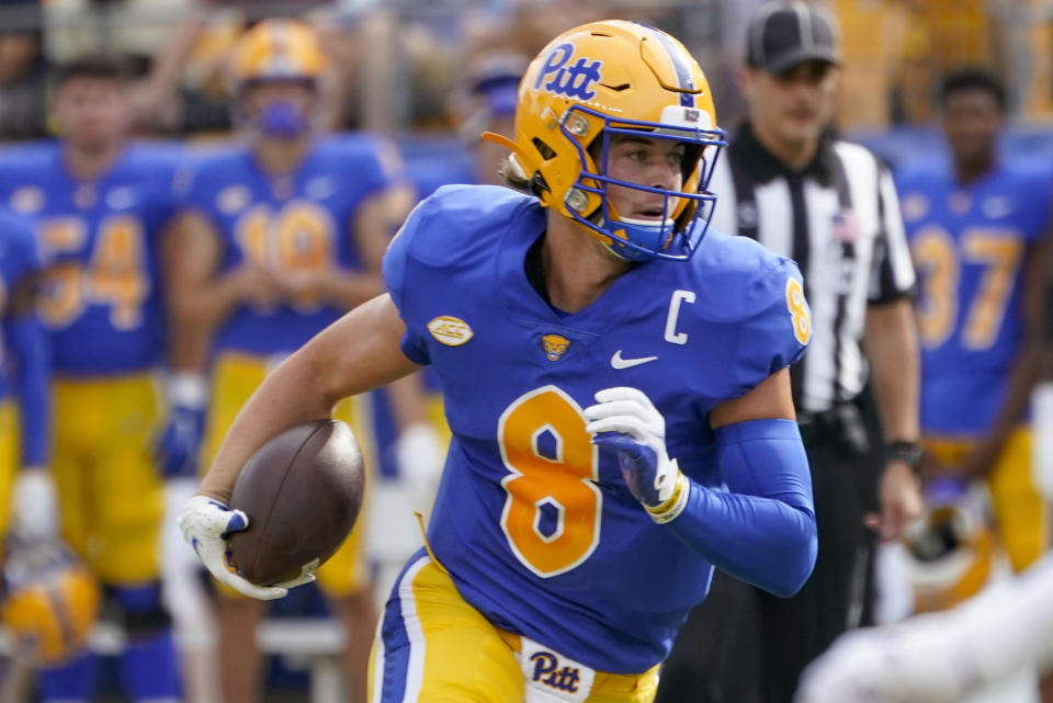 Pittsburgh quarterback Kenny Pickett (8) plays against Massachusetts during the first half of an NCAA college football game, Saturday, Sept. 4, 2021, in Pittsburgh. (AP Photo/Keith Srakocic)