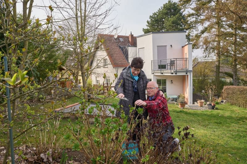 Beate and Ulrich Heinen garden on their property north-west of Germany's Frankfurt. He was a monk for 40 years and she's an ex-nun. They met as older adults and ended up as a married couple. An unusual love story. Thomas Frey/dpa