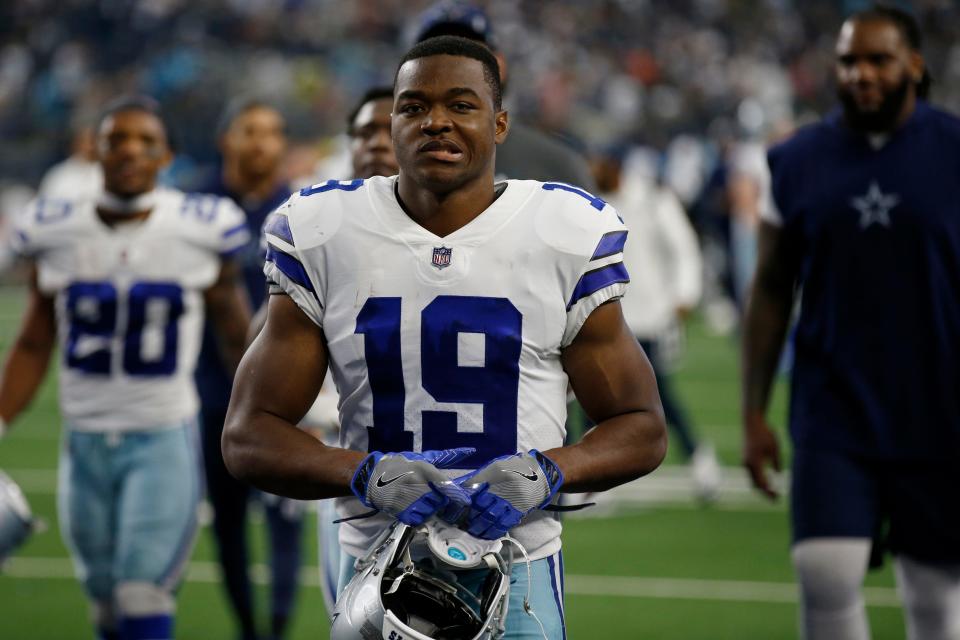 Dallas Cowboys wide receiver Amari Cooper leaves the field after an NFL football game against the Carolina Panthers in Arlington, Texas, Sunday, Oct. 3, 2021.