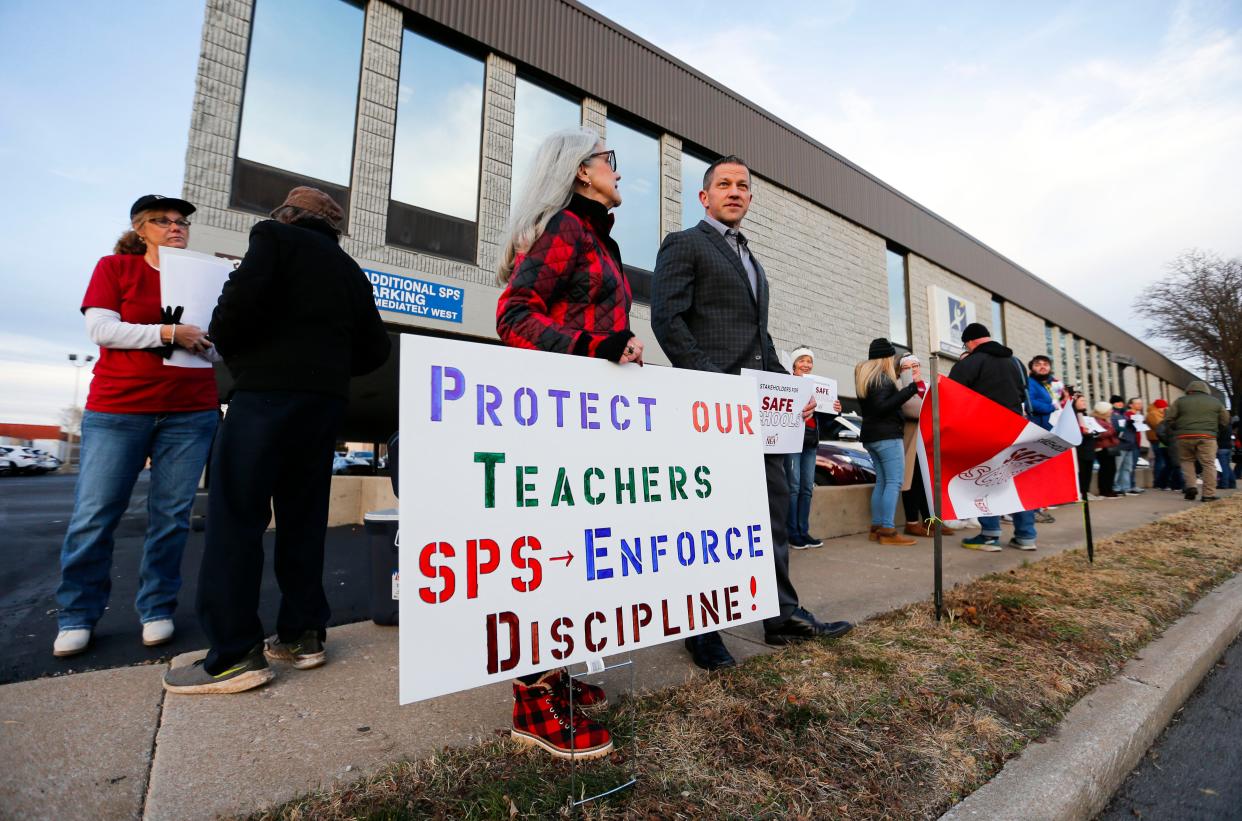 The Springfield National Education Association organized a "Stakeholders for Safe Schools" protest outside the the Kraft Administration Center Tuesday. Chad Rollins, a likely candidate for the school board, was part of the protest.