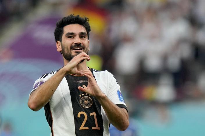 Germany&#39;s Ilkay Gundogan celebrates after scoring his side&#39;s opening goal during the World Cup group E football match between Germany and Japan, at the Khalifa International Stadium in Doha, Qatar, Wednesday, Nov. 23, 2022. (AP Photo/Luca Bruno)