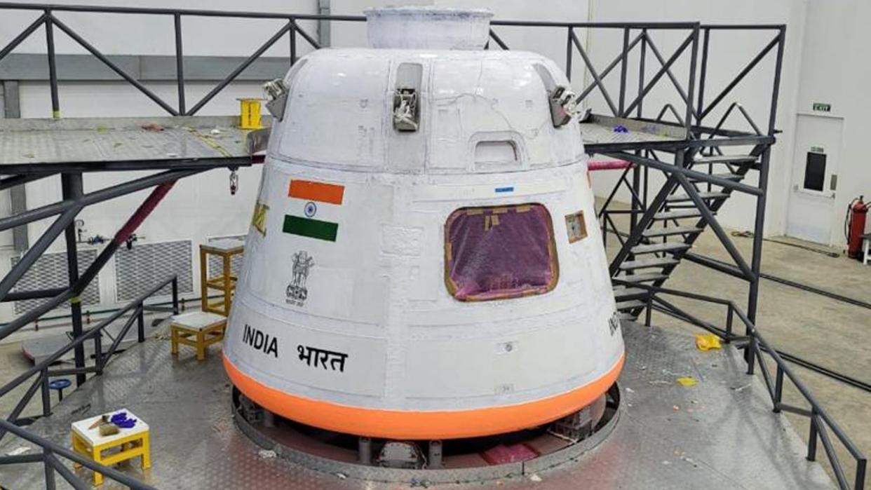  A view of a white module with the Indian flag painted on the side. 