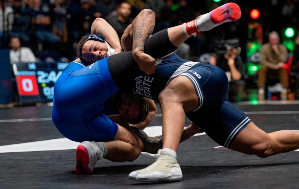 Penn State’s Greg Kerkvliet starts quick on Air Force’s Wyatt Hendrickson during the 285 lb bout of the National Wrestling Coaches Association All-Star Classic at Rec Hall on Tuesday, Nov. 21, 2023. Abby Drey/adrey@centredaily.com