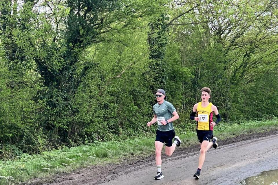 Race leaders Oliver Sherratt and Felix Wernham head to head in the lanes <i>(Image: Highworth Running Club)</i>