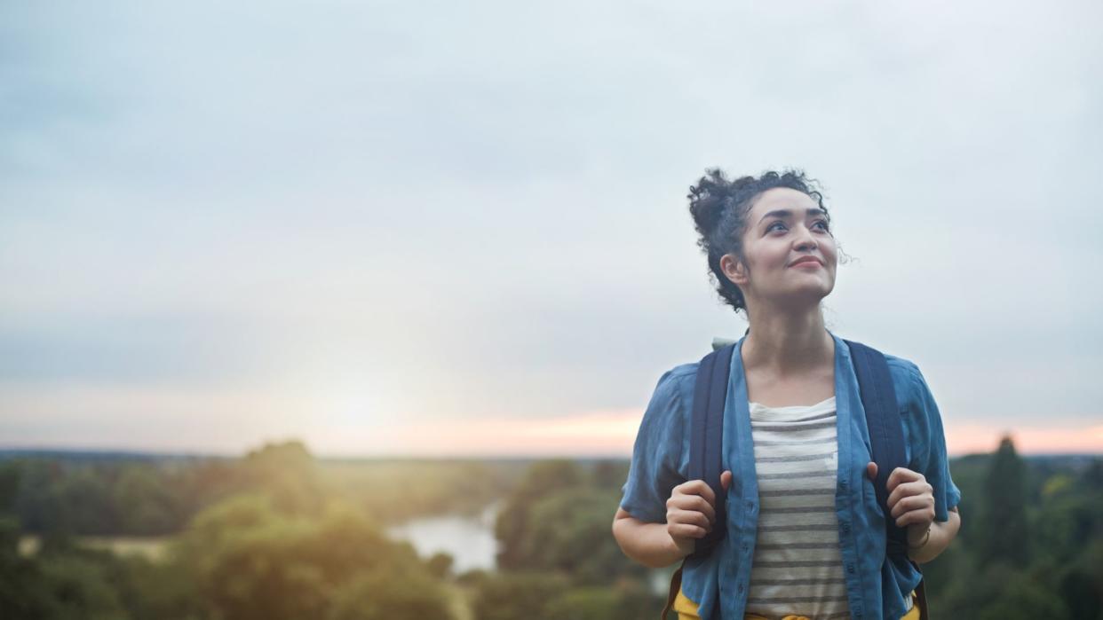  Calm, happy person goes for a walk. 