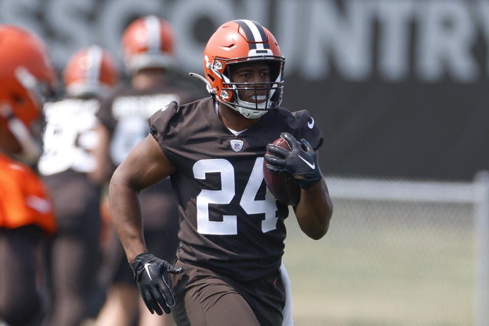 Cleveland Browns running back Nick Chubb takes part in drills at the NFL football team's practice facility Wednesday, June 7, 2023, in Berea, Ohio. (AP Photo/Ron Schwane)
