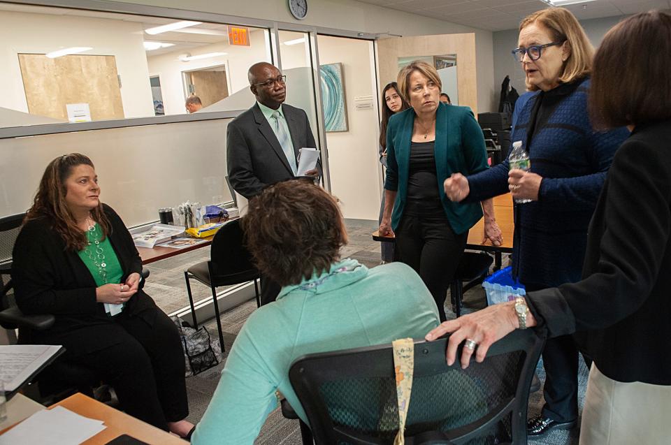 Gov. Maura Healey toured Riverside Community Behavioral Health Center in Milford and signed a proclamation for Mental Health Awareness Month with state and local officials, May 9, 2023. Pictured, from left, are Senior Family Partner for Mobile Crisis Intervention Lisa Boisseau, Riverside Vice President Manny Oppong, Healey and Secretary of Health and Human Services Kate Walsh.