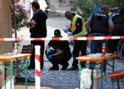 <p>Police secure the area after an explosion in Ansbach, Germany, July 25, 2016. (REUTERS/Michaela Rehle)</p>