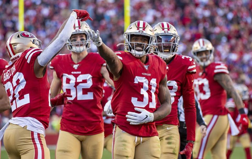 San Francisco 49ers running back Raheem Mostert (31) recovers fumble byMinnesota Vikings defensive back Marcus Sherels (35) in the third quarter and celebrates with teammates during an NFC playoff game at the Levi’s Stadium on Saturday, Jan 11, 2020 in Santa Clara.