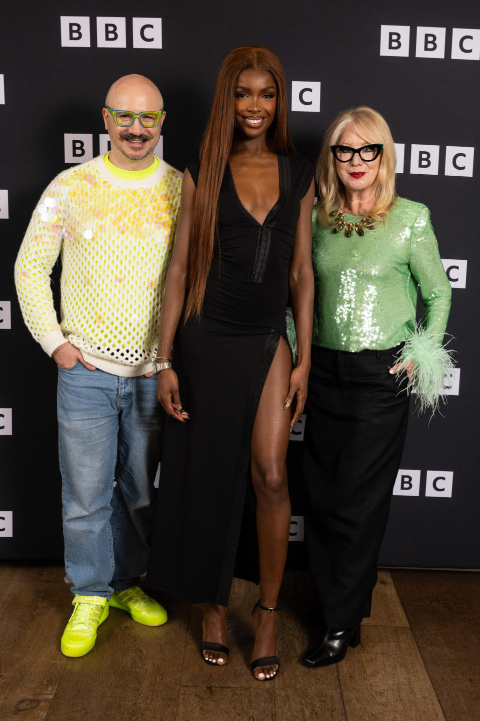 Leomie Anderson at the series 6 premiere of "Glow Up" at the Covent wearing black strappy sandals