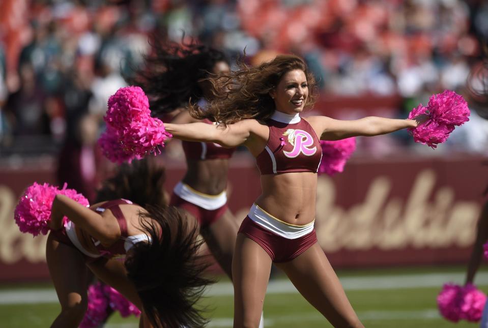 <p>Washington Redskins cheerleaders perform before an NFL football game between the Redskins and the Philadelphia Eagles, Sunday, Oct. 16, 2016, in Landover, Md. (AP Photo/Nick Wass) </p>