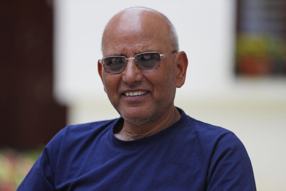 Puranjan Acharya, an independent analyst, speaks with the Associated Press during an interview at his residence in Kathmandu, Nepal, Friday, May 29, 2020. Nepal's latest border dispute with India, that has strained relations between the two South Asian countries with centuries-old historical, cultural and economical ties, has brought tiny Himalayan nation's bickering political parties together in a rare show of unity. ”It is just not the political parties but the whole population that is backing the government on the issue,” said Acharya. (AP Photo/Niranjan Shrestha)