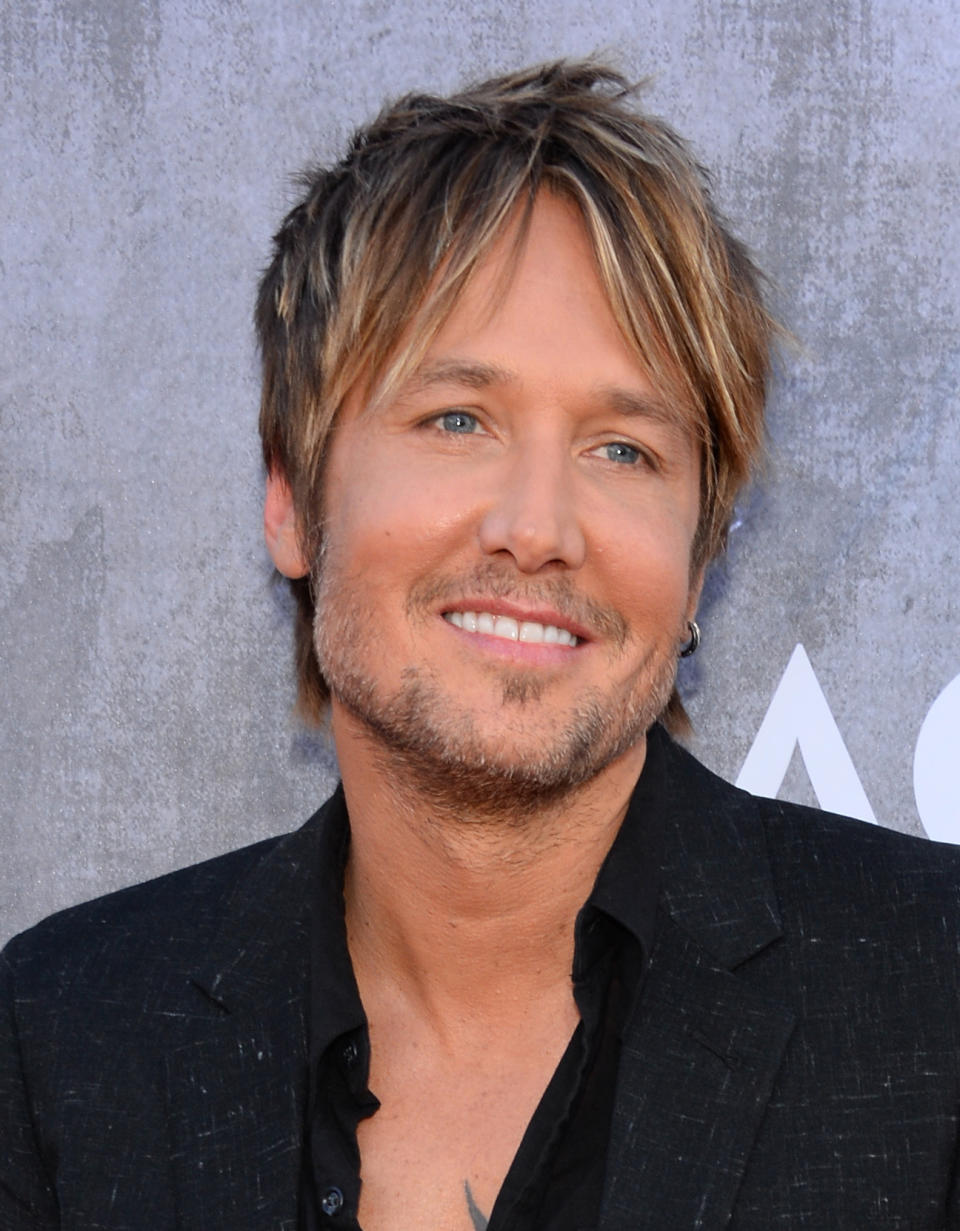 Keith Urban arrives at the 49th annual Academy of Country Music Awards at the MGM Grand Garden Arena on Sunday, April 6, 2014, in Las Vegas. (Photo by Al Powers/Powers Imagery/Invision/AP)