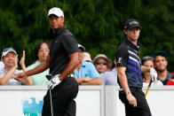 FARMINGDALE, NY - AUGUST 23: Rory McIlroy (R) of Northern Ireland and Tiger Woods look on from the tee box on the 11th hole during the First Round of The Barclays on the Black Course at Bethpage State Park August 23, 2012 in Farmingdale, New York. (Photo by Kevin C. Cox/Getty Images)