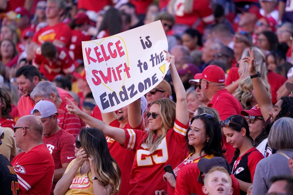 A fan holds a sign during a Kansas City Chiefs vs. Chicago Bears game Sunday, Sept. 24, 2023, in Kansas City, Mo. A potential romance between Taylor Swift and Travis Kelce has captured national interest, and Kelce's hometown of Cleveland Heights is rooting for them.