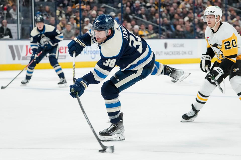 Nov 14, 2023; Columbus, Ohio, USA; Columbus Blue Jackets center Boone Jenner (38) fires a shot during the third period of the NHL hockey game against the Pittsburgh Penguins at Nationwide Arena. The Blue Jackets lost 5-3.