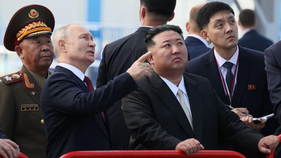 Russian President Vladimir Putin, center left, and North Korean leader Kim Jong Un, center right, visit the Vostochny Cosmodrome spaceport in Russia's region of Amur on Sept. 13, 2023. (Mikhail Metzel/AFP via Getty Images)