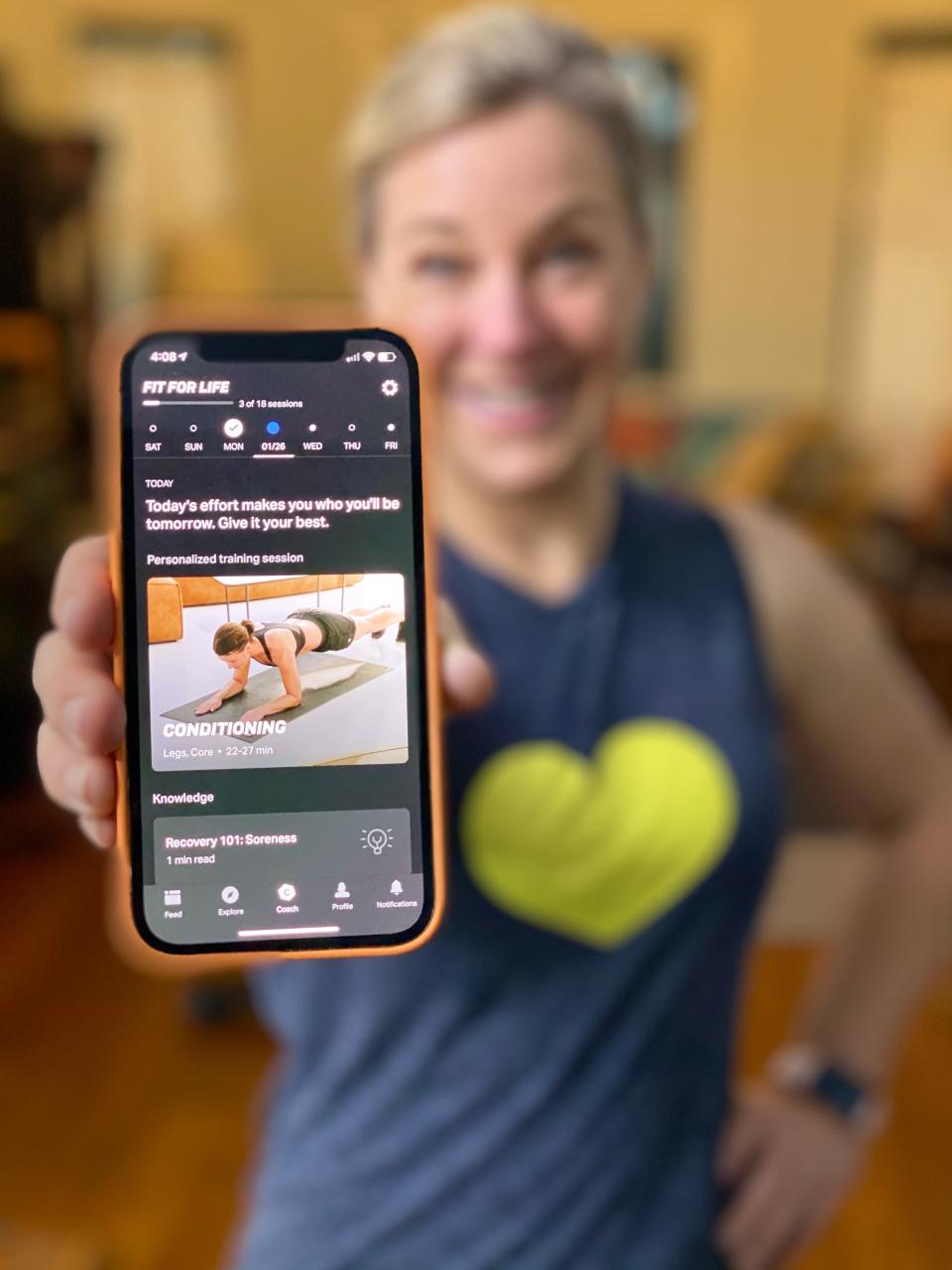 Consumer tech journalist Jennifer Jolly with the Freeletics app, which uses artificial intelligence to personalize fitness.