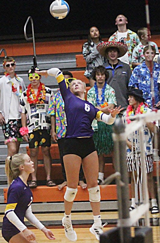 Watertown's Eve Hauger leaps to spikes the ball as teammate Addi Johnston looks on during their Eastern South Dakota Conference volleyball match on Tuesday, Sept. 5, 2023 in the Huron Arena.