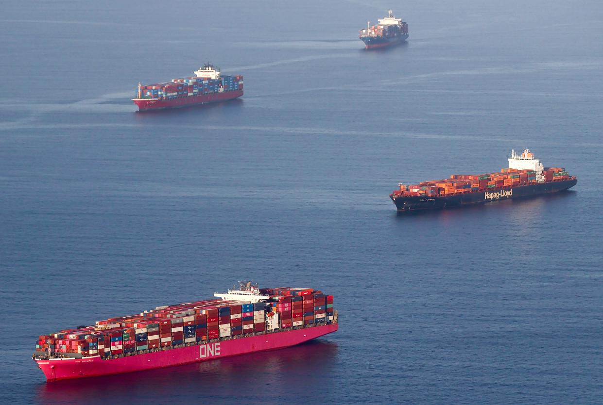 Container ships anchored by the ports of Long Beach and Los Angeles as they wait to offload on 20 September, 2021 (Getty Images)