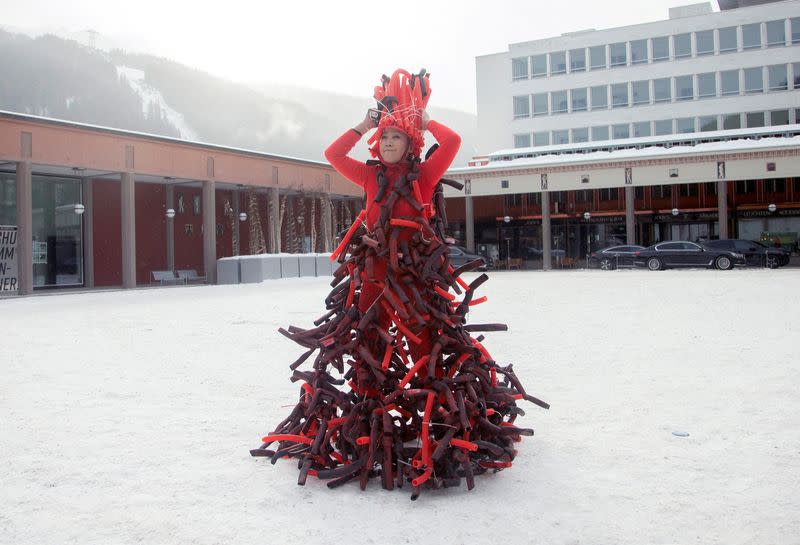 Chinese artist Kong Ning poses during the World Economic Forum in Davos