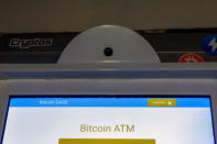 FILE PHOTO: A Bitcoin ATM is seen at the Bitcoin Center NYC in New York City, U.S. on November 27, 2017. REUTERS/Brendan McDermid/File Photo