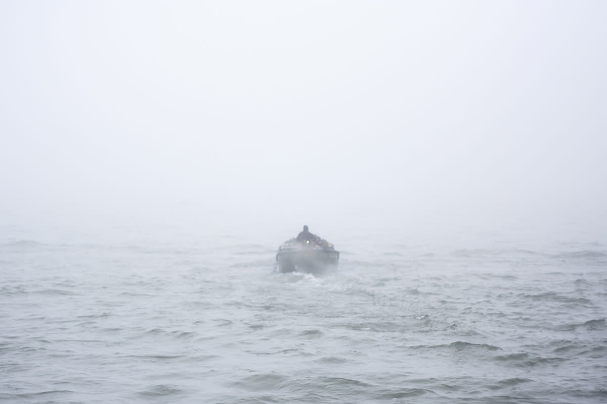 https://www.gettyimages.com/detail/photo/boat-in-the-fog-royalty-free-image/474088416?phrase=men+lost+at+sea&adppopup=true