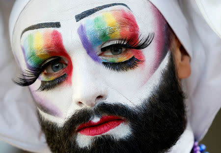 A participant poses while attending the inauguration of the Gay Games village at the Hotel de Ville city hall in Paris, France, August 4, 2018. REUTERS/Regis Duvignau