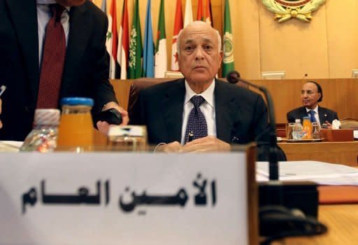 Arab League Secretary General Nabil al-Arabi (C) chairs an emergency meeting with Arab League foreign ministers, at the headquarters in Cairo, to discuss the political situation in Syria. Arabi called for observers to be deployed rapidly