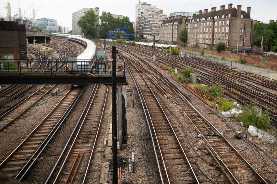 Hot weather caused problems on train tracks during the week, with more travel issues expected over the weekend thanks to a combination of weather, repair work and industrial action (Picture: PA)