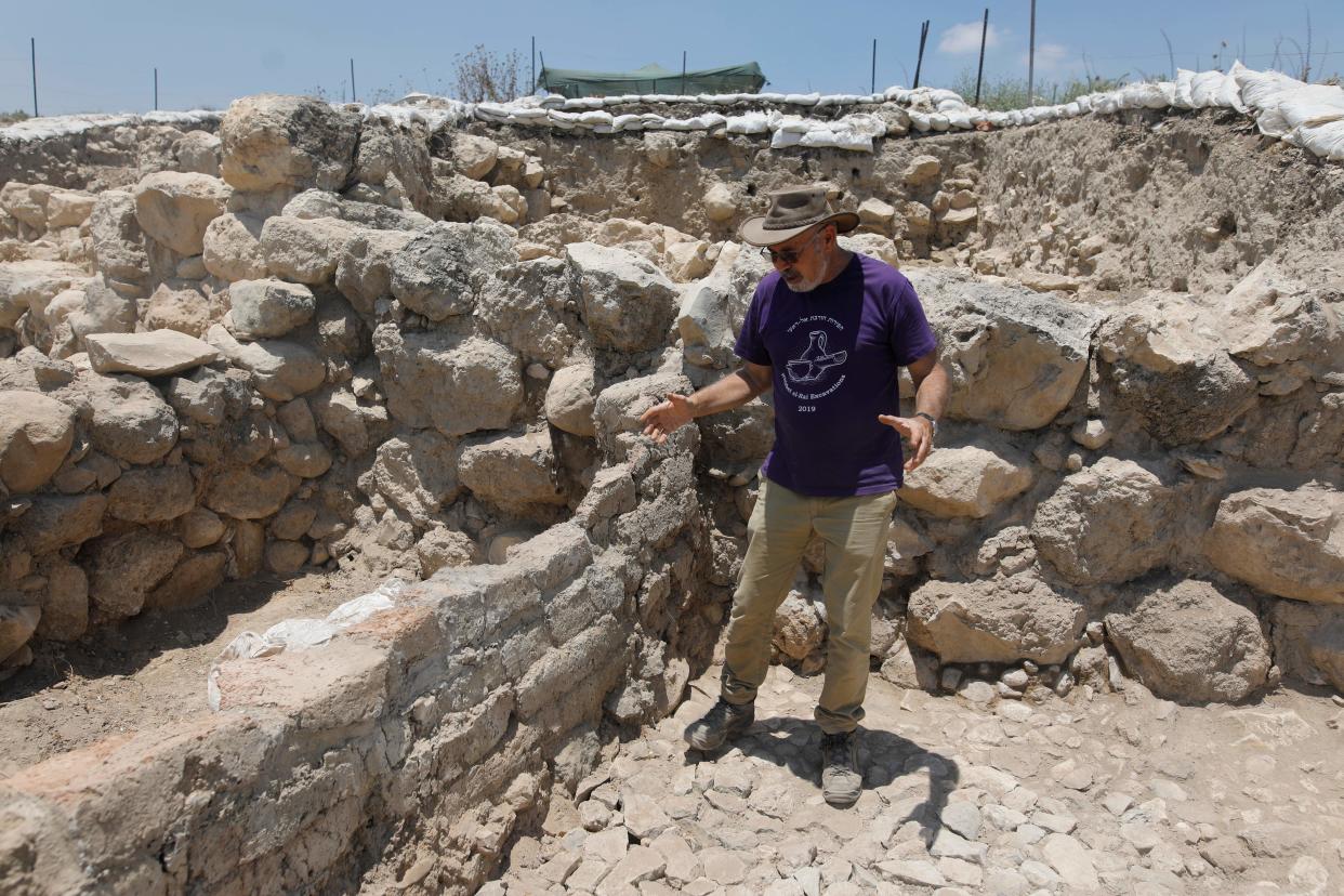 Yosef Garfinkel, professor at the Hebrew University, tours the archeological site claimed to be the Biblical town of Ziklag near the southern Israeli city of Kiryat Gat on July 8, 2019. - Researchers in Israel said they have pinpointed the site of an ancient Philistine town mentioned in the biblical tale of David seeking refuge from the Israelite king Saul. Ziklag was a town under the rule of a Philistine king in nearby Gath after the ancient "sea peoples" began arriving in the region in the 12th century BC, the researchers say. (Photo by MENAHEM KAHANA / AFP)        (Photo credit should read MENAHEM KAHANA/AFP/Getty Images)