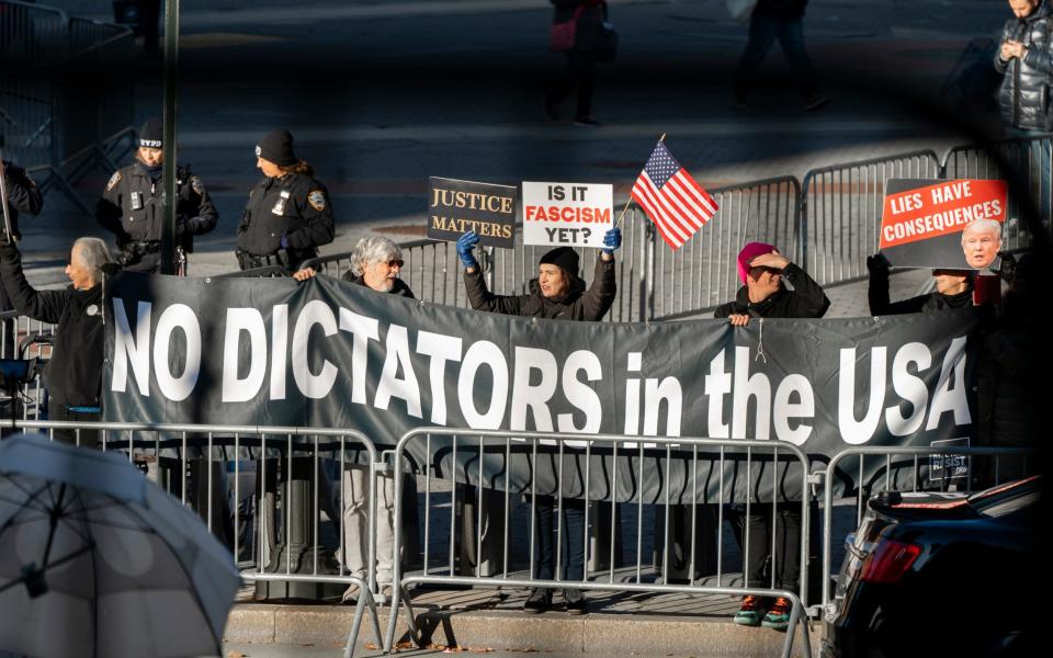 Anti-Trump protestors demonstrate outside the New York State Supreme Court