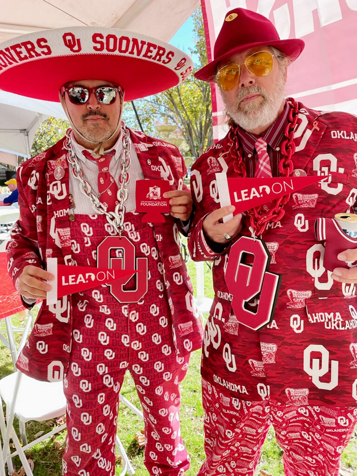 Marc Rangel, left, and Jerry Lewis attend a home game in Norman earlier this year dressed out in their gameday attire.