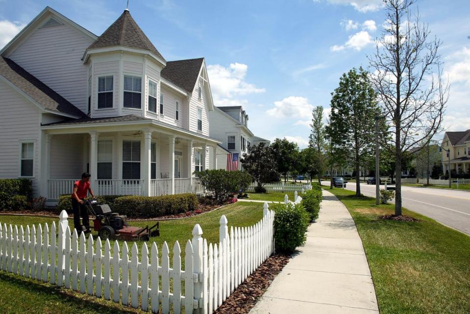 <div class="inline-image__caption"><p>Homes designed in the "new urbanism" style in Celebration, FL. </p></div> <div class="inline-image__credit">Preston Mack/Getty</div>