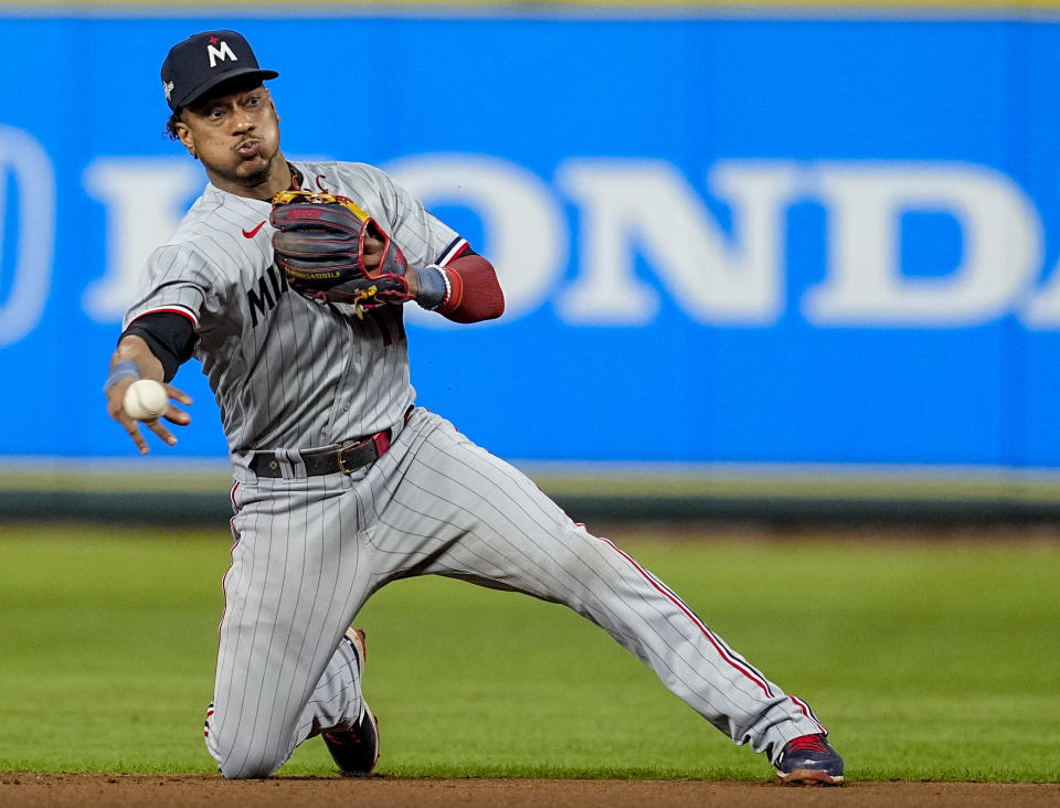 FILE - Minnesota Twins second baseman Jorge Polanco throws out Houston Astros' Jeremy Pena at first base during the seventh inning in Game 2 of an American League Division Series baseball game in Houston, Oct. 8, 2023. The Seattle Mariners have acquired Polanco from the Twins, Monday, Jan. 29, 2024, for pitchers Anthony DeSclafani and Justin Topa, two minor leaguers and cash. (AP Photo/Tony Gutierrez, File)