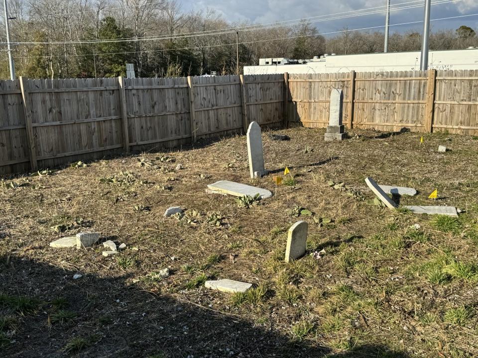 About a dozen gravestones are located in the Long Neck area of Millsboro, at Route 24 and Indian Mission Road, on a property where a Community Bank is to be built.