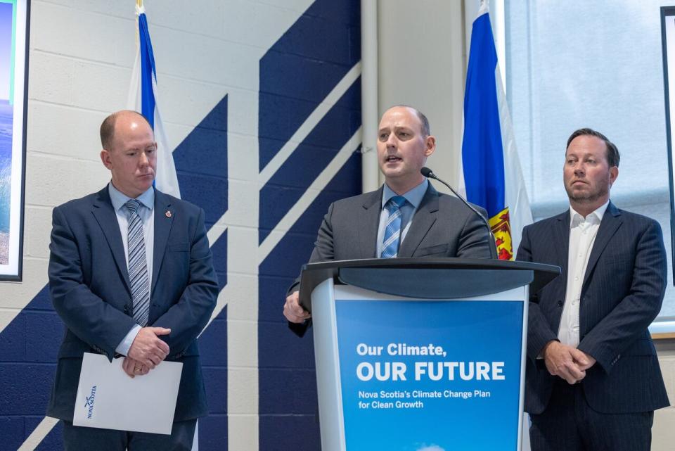 Nova Scotia Environment and Climate Change Minister Tim Halman (centre) at climate change plan announcement on Wednesday, Dec. 7, 2022.