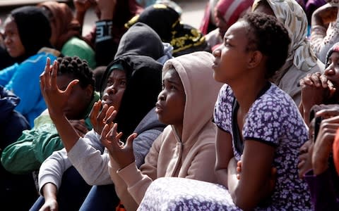 African migrants in a detention camp in Tripoli, Libya - Credit: Reuters