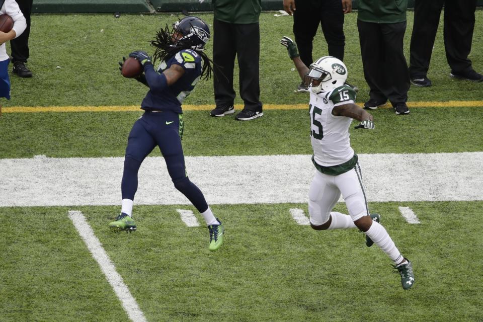 Richard Sherman, left, made a great interception in Week 4 (AP).