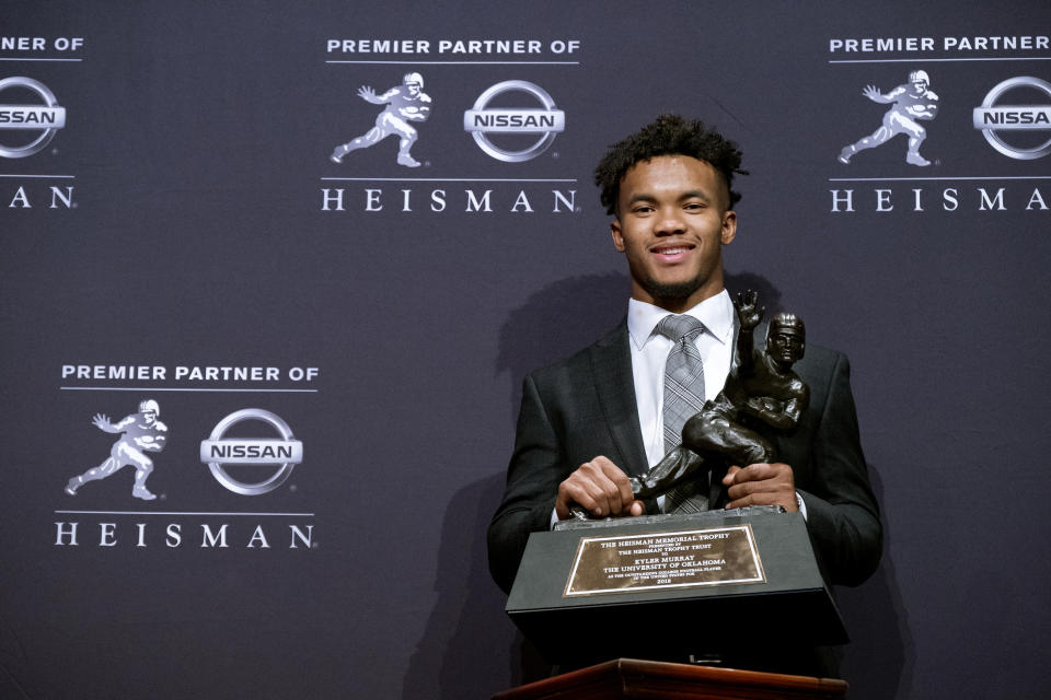 Oklahoma quarterback Kyler Murray holds the Heisman Trophy after winning the award Saturday, Dec. 8, 2018, in New York. (AP Photo/Craig Ruttle)