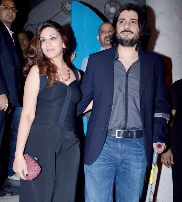 Sonali Bendre with her husband Goldie Behl at Bunty Walia's wedding reception