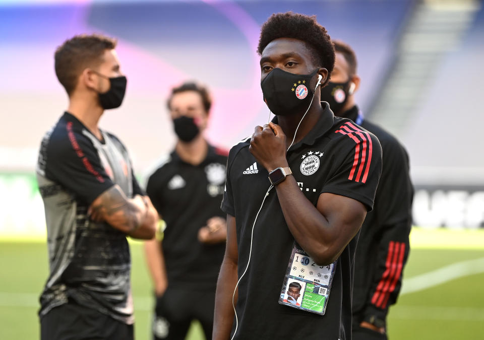 LISBON, PORTUGAL - AUGUST 23: Alphonso Davies of FC Bayern Munich looks on during a pitch inspection prior to the UEFA Champions League Final match between Paris Saint-Germain and Bayern Munich at Estadio do Sport Lisboa e Benfica on August 23, 2020 in Lisbon, Portugal. (Photo by Michael Regan - UEFA/UEFA via Getty Images)