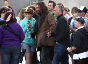 <b>Hairy Monster</b><br><br>Hugh Jackman looks nearly unrecognizable as he channels his inner vagrant to act in "The Wolverine." <br><br>Hugh was mobbed by excited fans between takes, and he happily took time out to pose for pictures and sign autographs on Friday, Aug. 3.