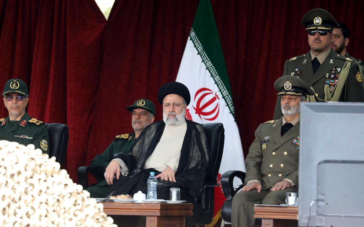 Iran's President Ebrahim Raisi attends a military parade marking the country's annual army day in Tehran on April 17