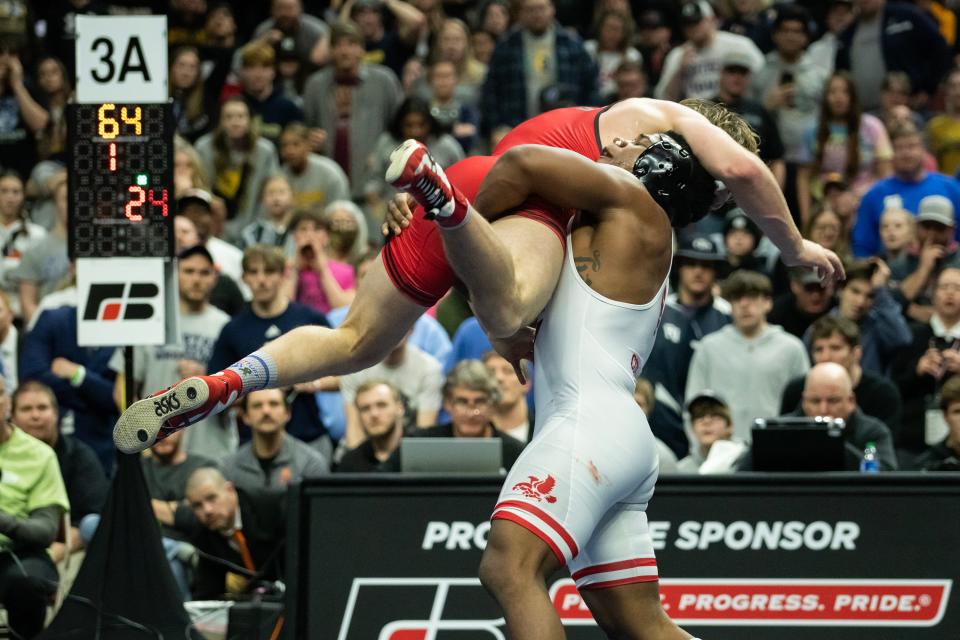 Gabe Arnold, Iowa City, City High, wrestles Tate Naaktgeboren, Linn-Mar, in the Class 3A state wrestling tournament championship match at 182 pounds on Saturday, Feb. 18, 2023, at Wells Fargo Arena, in Des Moines.