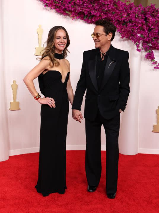 HOLLYWOOD, CALIFORNIA – MARCH 10: (L-R) Susan Downey and Robert Downey Jr. attend the 96th Annual Academy Awards on March 10, 2024 in Hollywood, California. (Photo by Kevin Mazur/Getty Images)